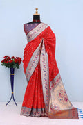 Has floral and peacock motifs on the zari border and pallu - RED