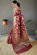 Pretty Maroon Color Banarasi Silk Zari Weaving Saree With Blouse Piece