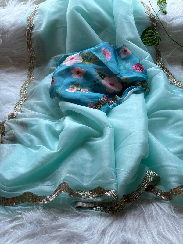 Soft And Shining Tissue Silver Net Party Wear Saree